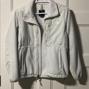 Women’s white North Face jacket.